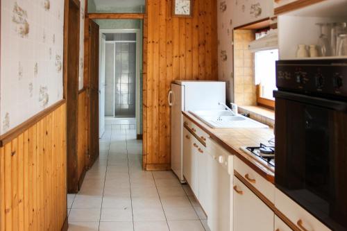 Kuchyň nebo kuchyňský kout v ubytování Gîte Domaine des Iris
