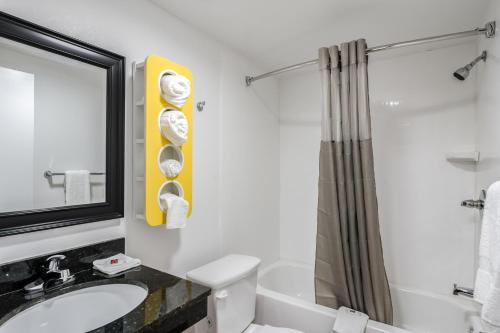 a bathroom with a sink and a toilet and a shower at Motel 6-White, GA - Cartersville in White