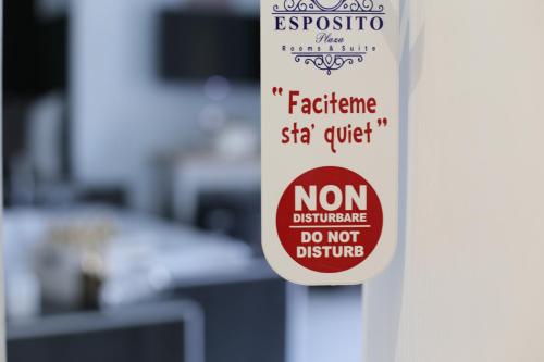 a label on a door with a sign on it at ESPOSITO PLAZA- ROOMS & SUITE in Naples