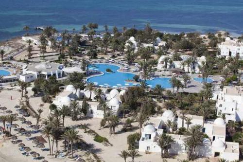 an aerial view of a resort with several pools at El Mouradi Djerba Menzel in Midoun