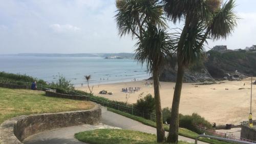 a view of a beach with people in the water at Palace Guesthouse in Newquay