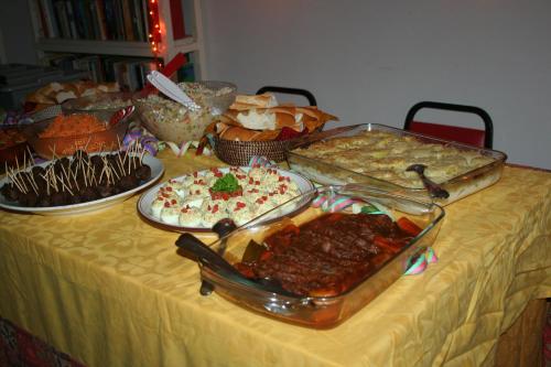 a table with many different types of food on it at Auberge Keur Diame in Dakar