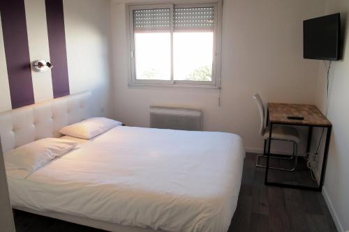 Postel nebo postele na pokoji v ubytování Hôtel le Rohu