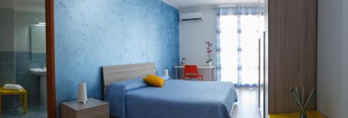 Katil atau katil-katil dalam bilik di B&B Mediterraneo