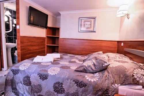 Una cama o camas en una habitación de Willa ZAKObystra