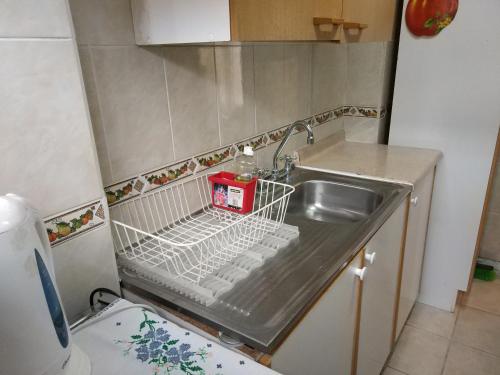 Kuchyň nebo kuchyňský kout v ubytování Apart Hotel Aleman