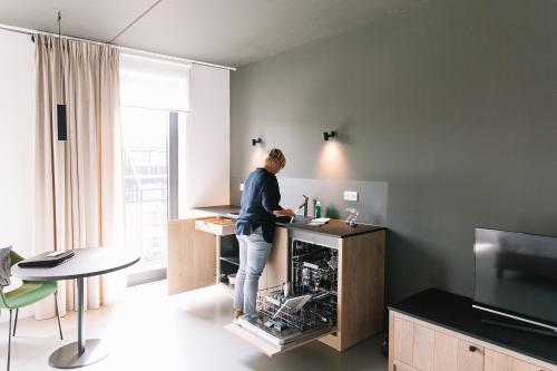 TV a/nebo společenská místnost v ubytování TRUST Hotel