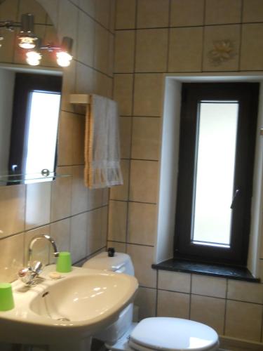 Ein Badezimmer in der Unterkunft Le K d'Or
