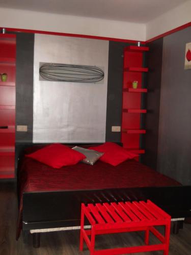 Ein Bett oder Betten in einem Zimmer der Unterkunft Le K d'Or