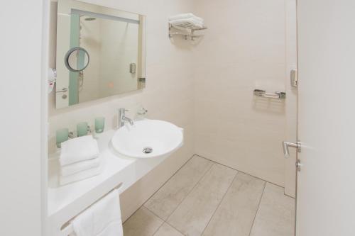 Kúpeľňa v ubytovaní Hotel Rimo