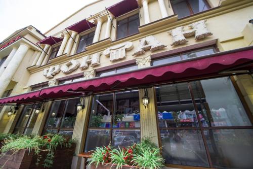 a store front of a building with plants at Fontan in Chornomorsk