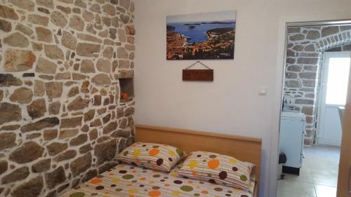 Postel nebo postele na pokoji v ubytování Holiday House Popovic