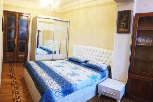 Кровать или кровати в номере Icheri Sheher Apartment