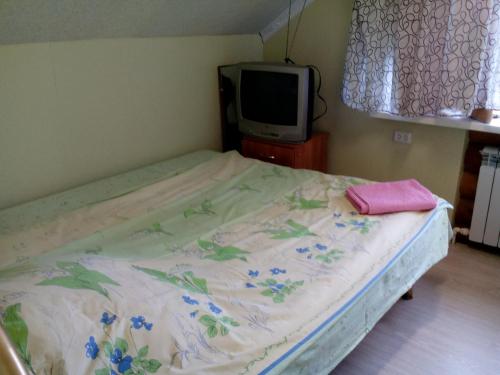 
Кровать или кровати в номере Guest House on Naberezhnaya Street
