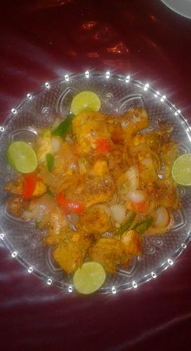 a glass bowl of food on a table at Dealings Freedom Rest in Gampola