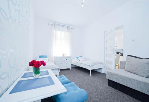 En eller flere senge i et værelse på Bolesława Chrobrego 34