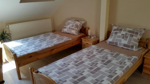 Postel nebo postele na pokoji v ubytování Gästezimmer Langenselbold