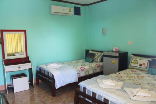 Giường trong phòng chung tại Lam-tong Resort