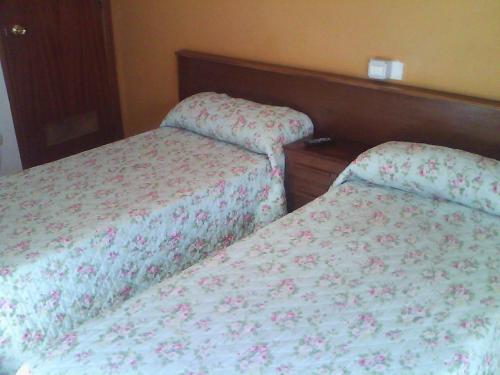 Letto o letti in una camera di Hostel Central Zaragoza