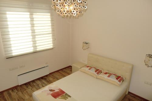 Postel nebo postele na pokoji v ubytování Sea Garden Lux Apartment