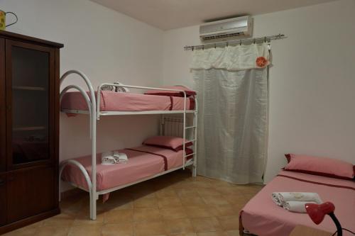 Ένα ή περισσότερα κρεβάτια σε δωμάτιο στο Casa Maja