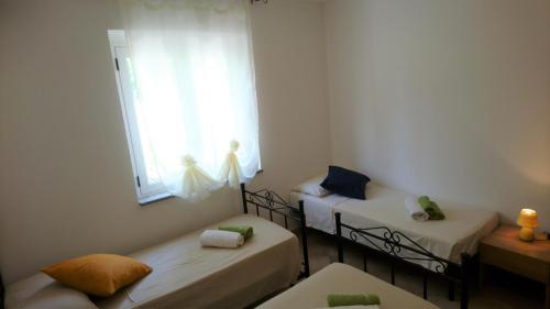 Ένα ή περισσότερα κρεβάτια σε δωμάτιο στο Casa Maja