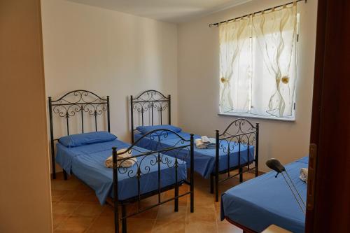 Ένα ή περισσότερα κρεβάτια σε δωμάτιο στο Casa Maja