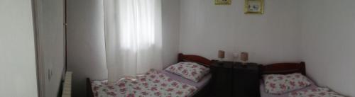 Cama o camas de una habitación en Apartments Jurašić