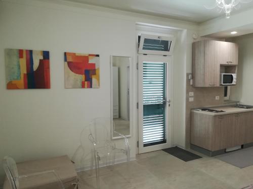 a kitchen with a sink and a counter top at Guest House B&B Via Marina in Reggio Calabria
