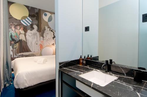 Łóżko lub łóżka w pokoju w obiekcie Amor de Dios 17 Boutique Apartments