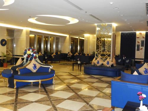 Posezení v ubytování Swiss Blue serviced Apartments- Al Zahra