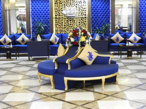 Posezení v ubytování Swiss Blue serviced Apartments- Al Zahra