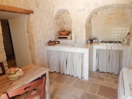 Kjøkken eller kjøkkenkrok på Trulli & Grotte Exclusive House