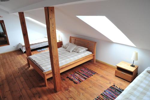 Ένα ή περισσότερα κρεβάτια σε δωμάτιο στο Ranczo Sielanka