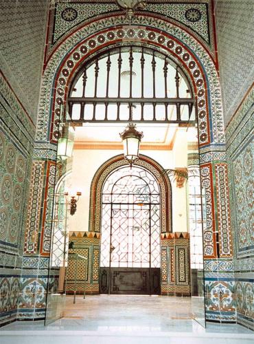 an ornate entrance to a building with a large door at Hotel San Gil in Seville