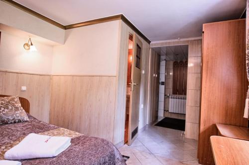 Una cama o camas en una habitación de Willa ZAKObystra