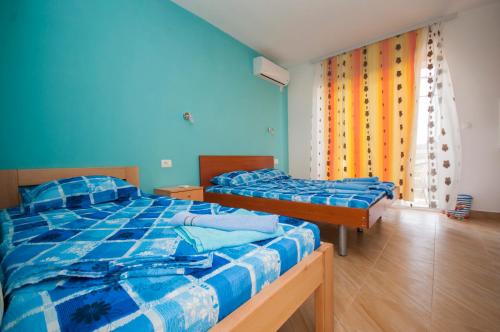 Postel nebo postele na pokoji v ubytování Studio Apartments Tea
