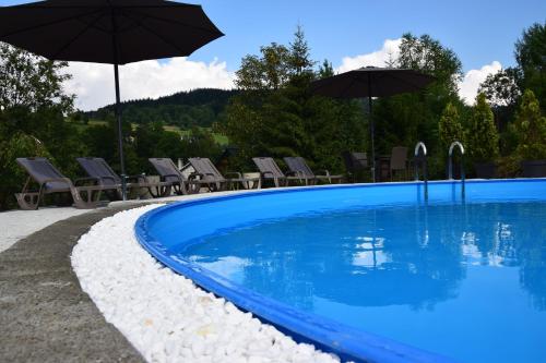 Bazén v ubytování Apartamenty Eskapada nebo v jeho okolí