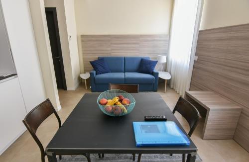 Coin salon dans l'établissement 3 Amici Suites