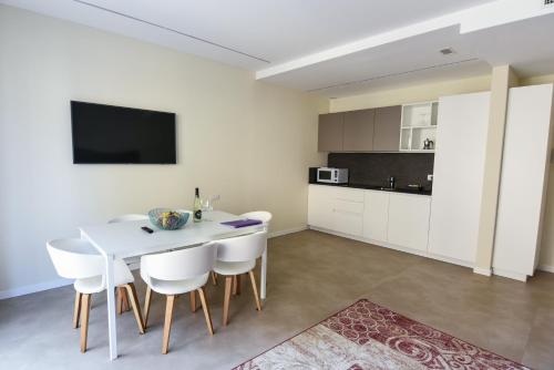 Cuisine ou kitchenette dans l'établissement 3 Amici Suites