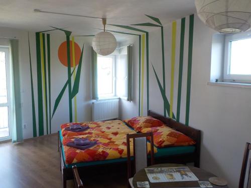 Кровать или кровати в номере Guest House Beroun