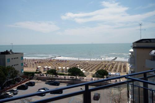a view of the beach from a balcony at Hotel Bellevue in Caorle