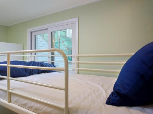 a bedroom with a bunk bed and a window at Seoul Forest Stay in Seoul