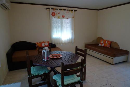 Χώρος καθιστικού στο Haus Platanos Apartments & Bungalows by the Sea