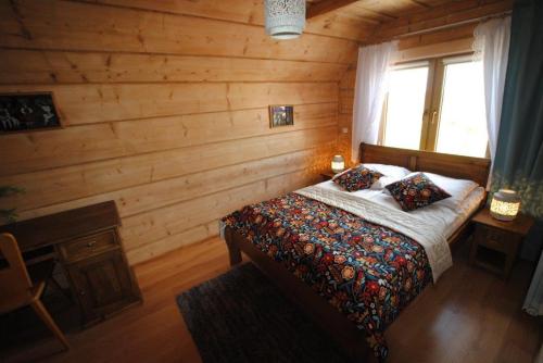 Pokoje u Staszkaにあるベッド