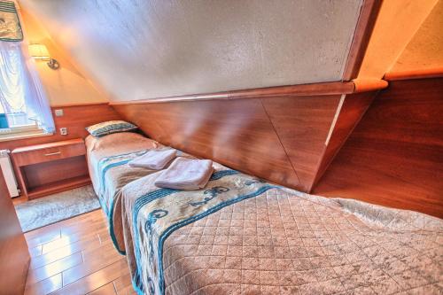 Una cama o camas en una habitación de Willa ZAKObystra
