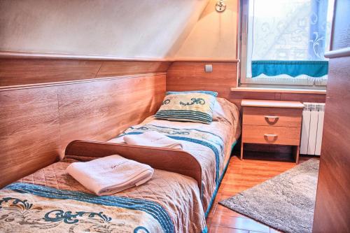 Una cama o camas en una habitación de Willa ZAKObystra