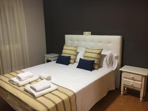 Ένα ή περισσότερα κρεβάτια σε δωμάτιο στο Hostal IMAGINATELO