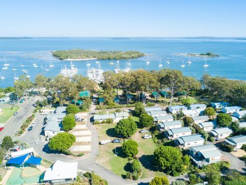 an aerial view of a marina with boats in the water at Thou Walla Sunset Retreat in Soldiers Point