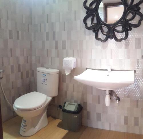 Ένα μπάνιο στο Centro Bajo Hotel & Resto